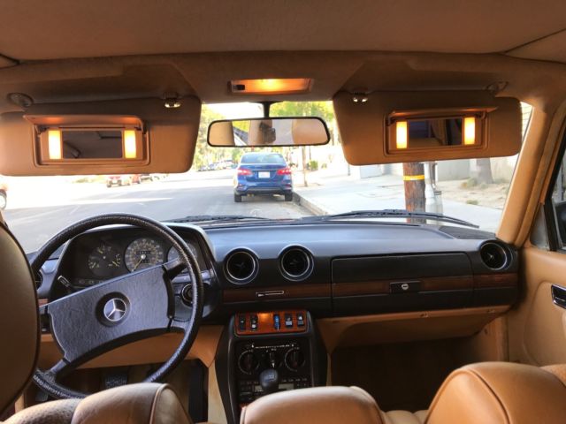 1983 Burgundy Mercedes-Benz 200-Series Sedan