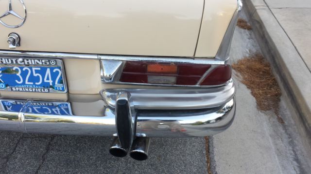 1965 Cream Mercedes-Benz 200-Series Sedan