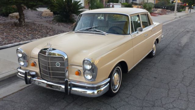 1965 Cream Mercedes-Benz 200-Series Sedan