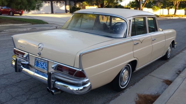 1965 Cream Mercedes-Benz 200-Series Sedan