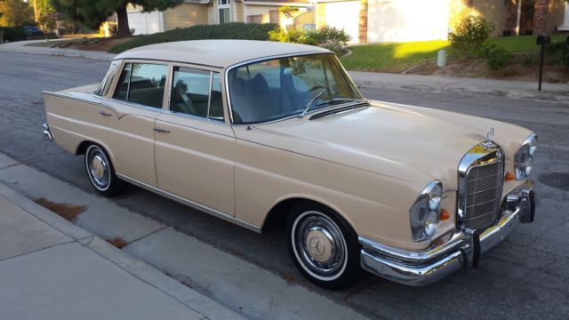 1965 Cream Mercedes-Benz 200-Series Sedan