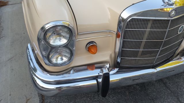 1965 Cream Mercedes-Benz 200-Series Sedan