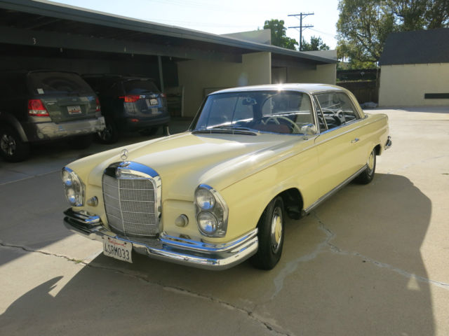 1963 White Mercedes-Benz 200-Series Coupe
