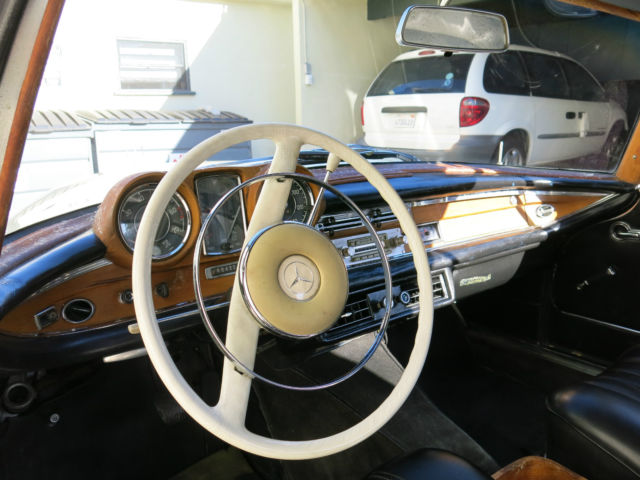 1963 White Mercedes-Benz 200-Series Coupe