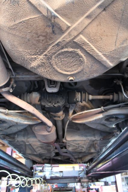 1978 Red Mercedes-Benz 200-Series Sedan