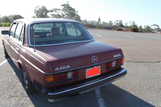1978 Red Mercedes-Benz 200-Series Sedan