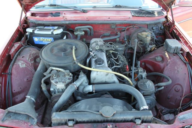 1978 Red Mercedes-Benz 200-Series Sedan