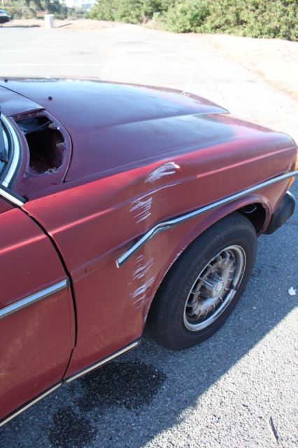 1978 Red Mercedes-Benz 200-Series Sedan