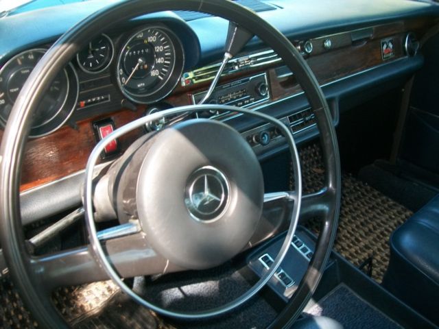 1972 blue Mercedes-Benz 200-Series