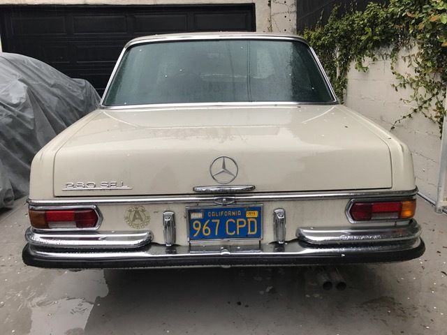 1970 White Mercedes-Benz 200-Series Sedan