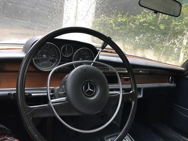 1970 White Mercedes-Benz 200-Series Sedan