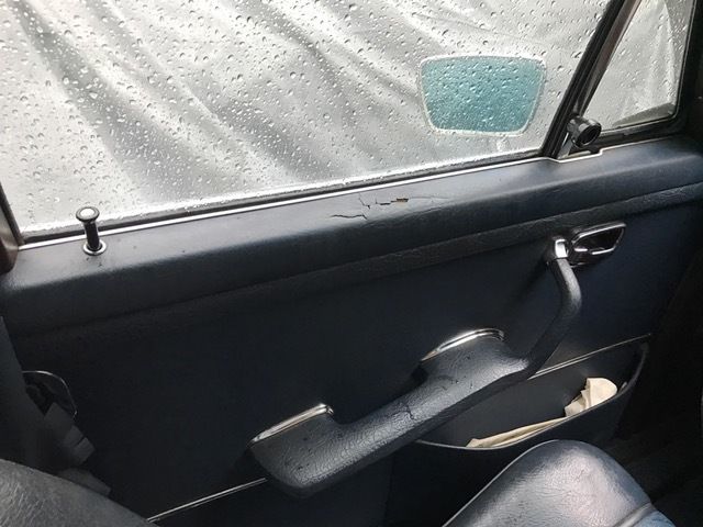 1970 White Mercedes-Benz 200-Series Sedan