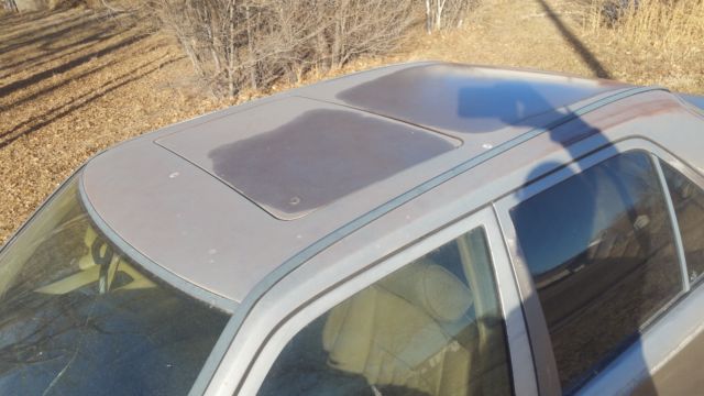 1988 Brown Mercedes-Benz 300-Series Sedan