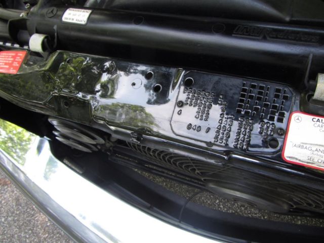 1989 Black Mercedes-Benz 400-Series Sedan