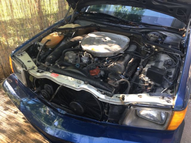 1985 Silver Mercedes-Benz 500-Series Coupe