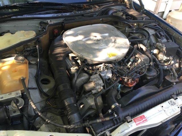 1985 Silver Mercedes-Benz 500-Series Coupe