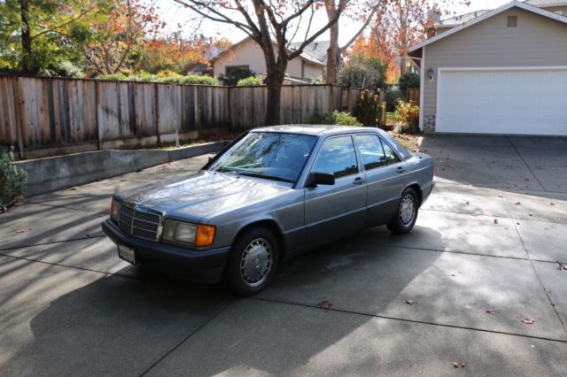 1987 gold  Mercedes-Benz 190-Series 4 door