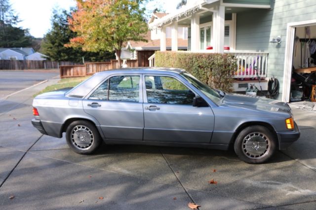 1987 gold  Mercedes-Benz 190-Series 4 door