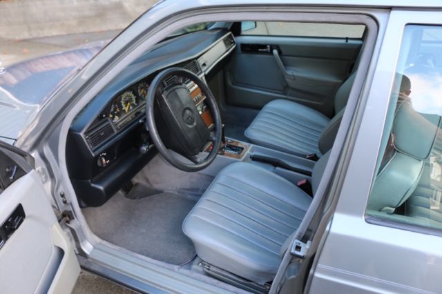 1987 gold  Mercedes-Benz 190-Series 4 door