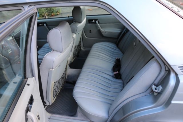 1987 gold  Mercedes-Benz 190-Series 4 door