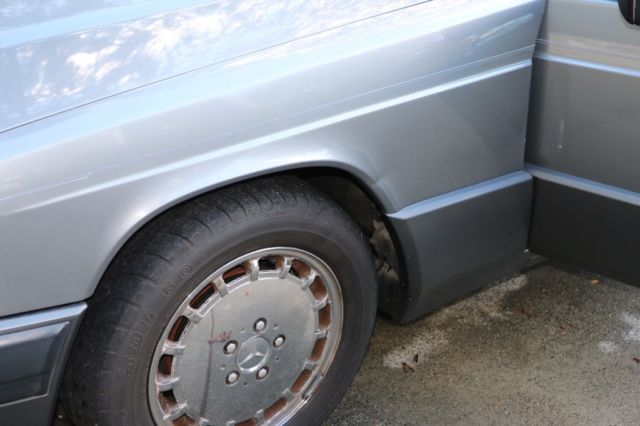 1987 gold  Mercedes-Benz 190-Series 4 door