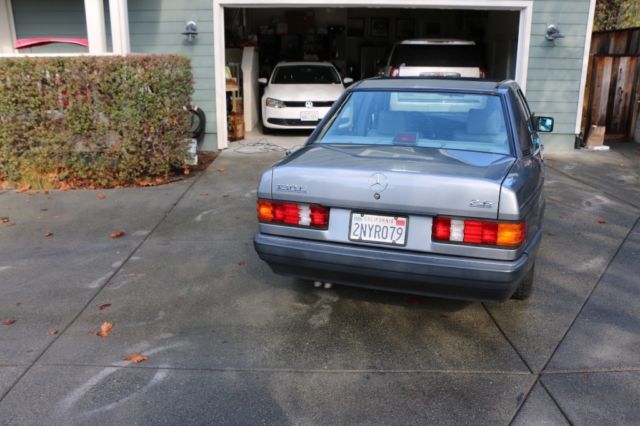 1987 gold  Mercedes-Benz 190-Series 4 door