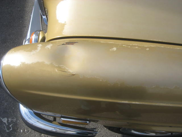 19700000 Gold Mercedes-Benz 200-Series Sedan