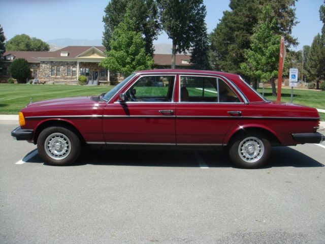 1985 Burgundy Mercedes-Benz 300-Series Sedan