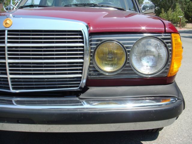 1985 Burgundy Mercedes-Benz 300-Series Sedan