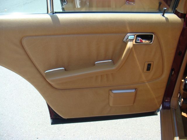 1985 Burgundy Mercedes-Benz 300-Series Sedan