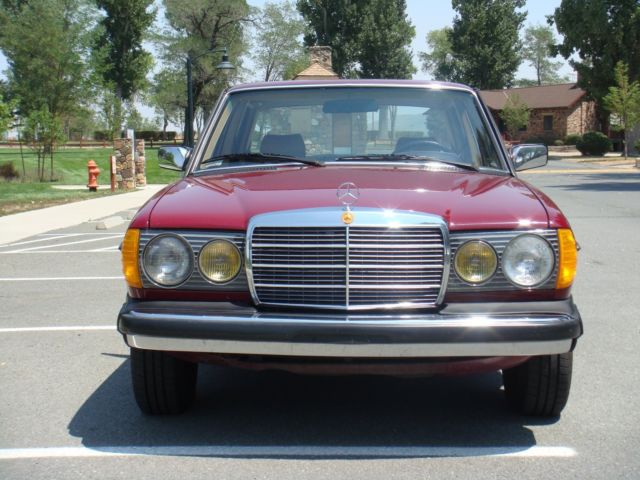 1985 Burgundy Mercedes-Benz 300-Series Sedan