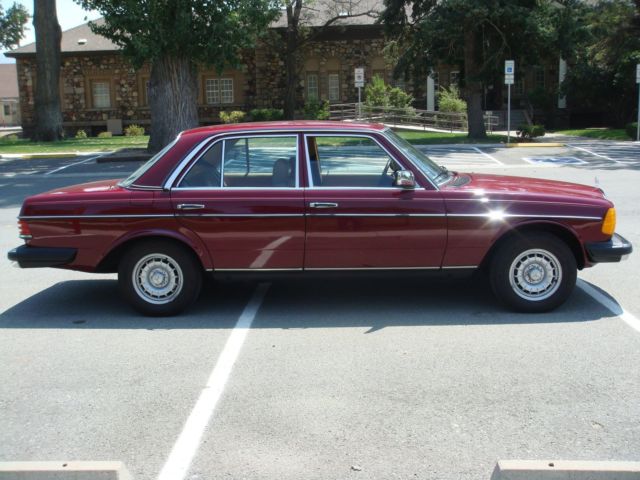 1985 Burgundy Mercedes-Benz 300-Series Sedan