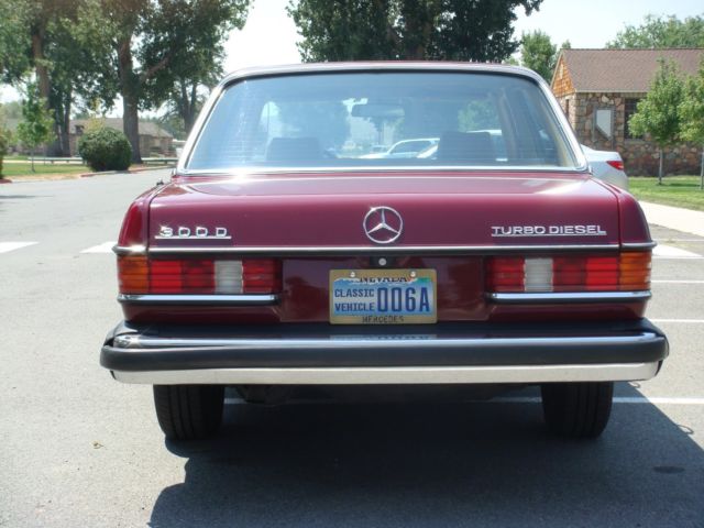 1985 Burgundy Mercedes-Benz 300-Series Sedan