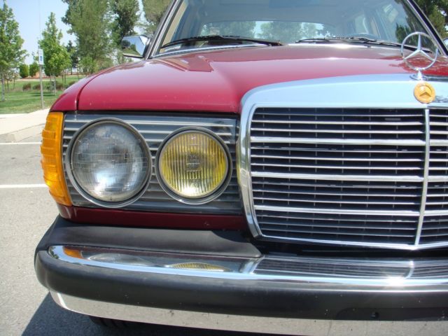 1985 Burgundy Mercedes-Benz 300-Series Sedan