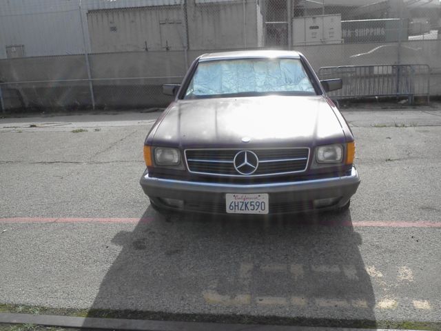 1985 Maroon Mercedes-Benz 500-Series Coupe