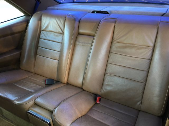 1984 Burgandy Mercedes-Benz 500-Series Coupe