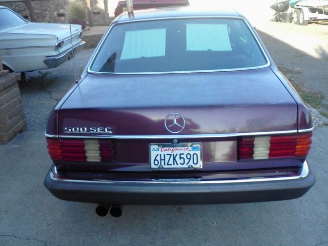 1985 Maroon Mercedes-Benz 500-Series Coupe