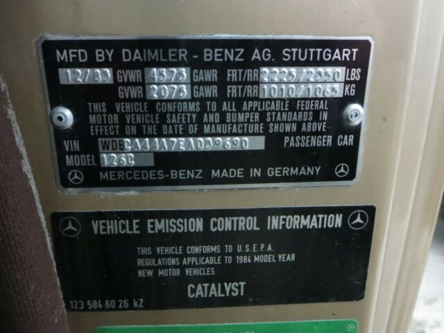 1984 Gold Mercedes-Benz 500-Series Coupe