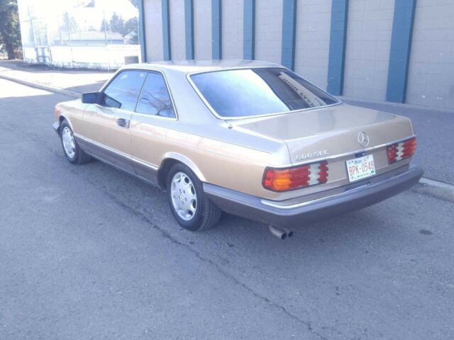 1984 Gold Mercedes-Benz 500-Series Coupe