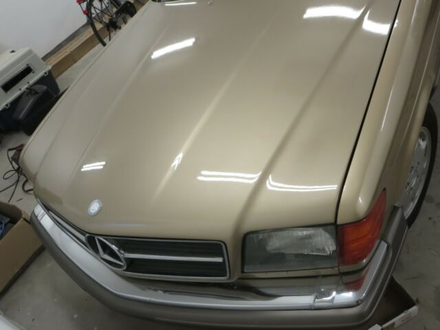 1984 Gold Mercedes-Benz 500-Series Coupe