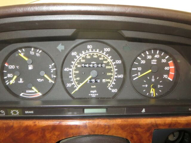 1984 Gold Mercedes-Benz 500-Series Coupe