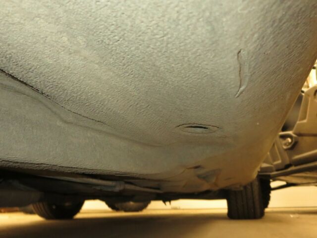 1984 Gold Mercedes-Benz 500-Series Coupe