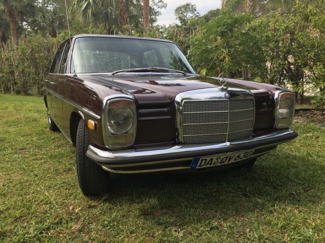 1969 Red Mercedes-Benz 200-Series Sedan