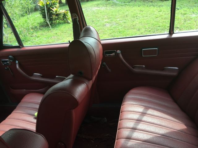 1969 Red Mercedes-Benz 200-Series Sedan