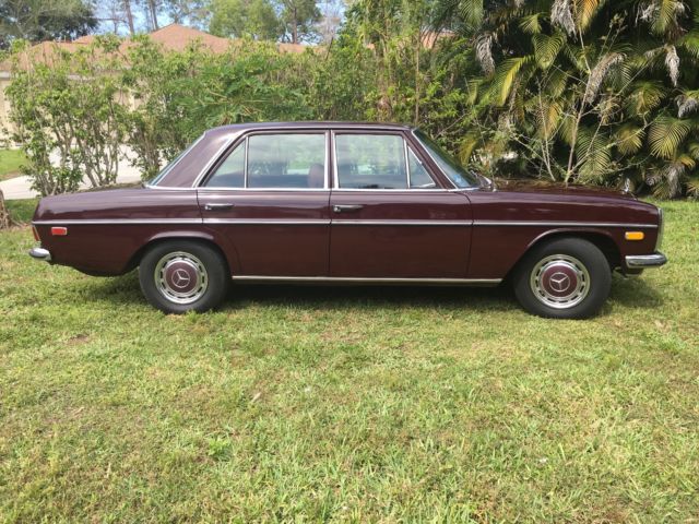 1969 Red Mercedes-Benz 200-Series Sedan