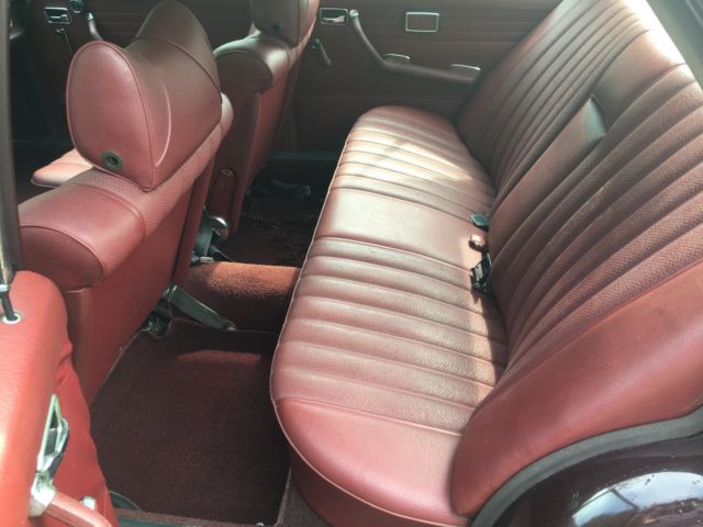 1969 Red Mercedes-Benz 200-Series Sedan