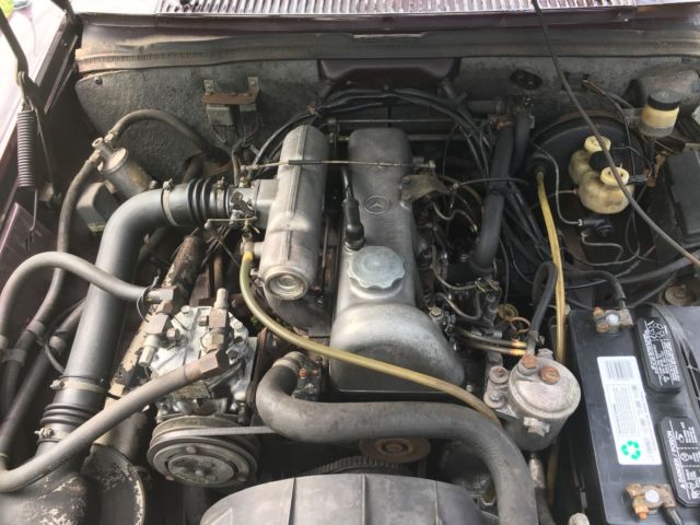 1969 Red Mercedes-Benz 200-Series Sedan