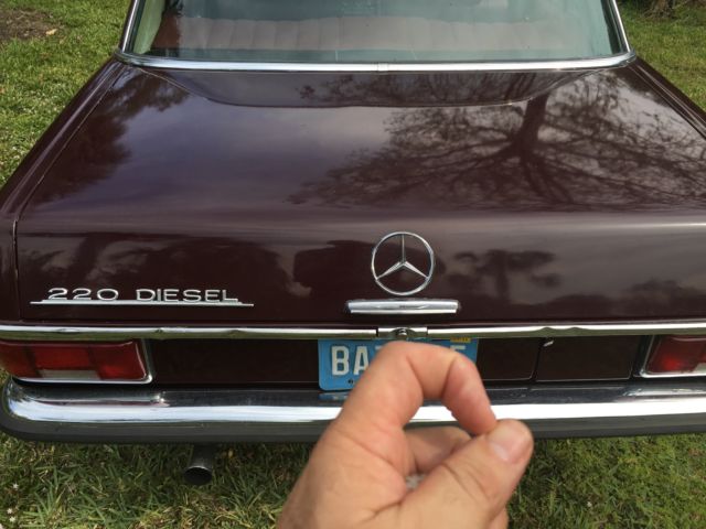 1969 Red Mercedes-Benz 200-Series Sedan