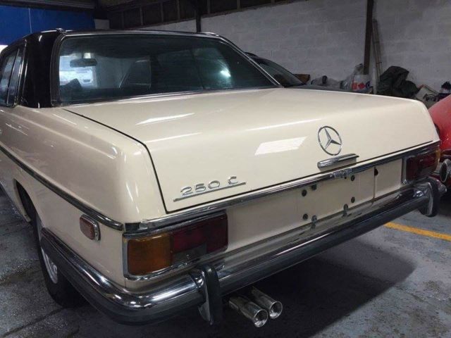 1972 cream and black Mercedes-Benz W114 Coupe
