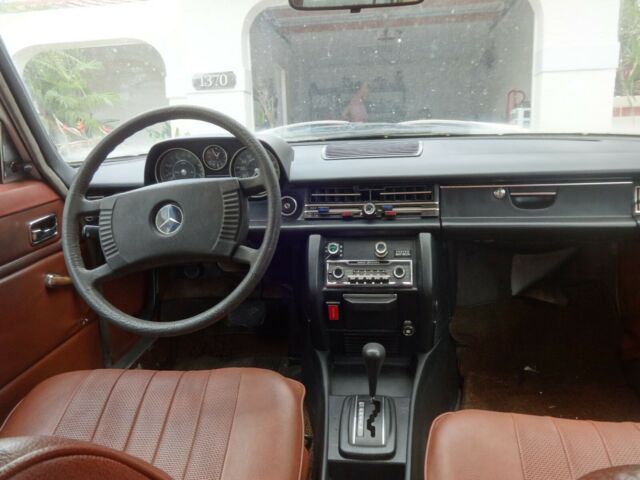 1976 White Mercedes-Benz 200-Series Sedan